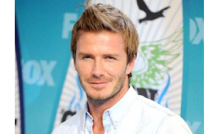 Дэвид Бекхэм показал стриптиз во время матча ФОТО