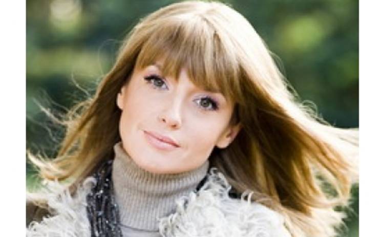 Оксану Марченко выручает шапочка