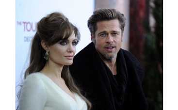 Анджелина Джоли наколола Брэда Питта ФОТО