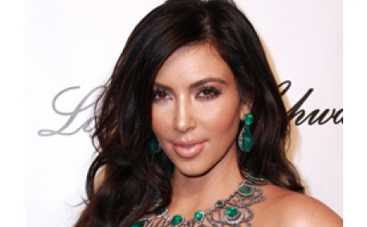 Ким Кардашьян сверкнула рейтузами ФОТО