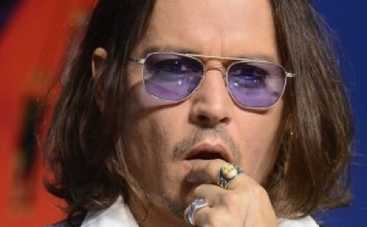 Джони Депп выплатил компенсацию женщине за публичное унижение