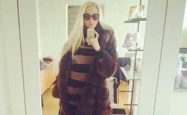 Оля Полякова подожгла соседу звонок на двери