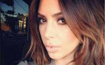 Ким Кардашьян показала могучий пресс (ФОТО)