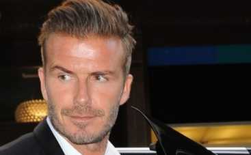 Дэвид Бекхем привел сына на модный показ (ФОТО)